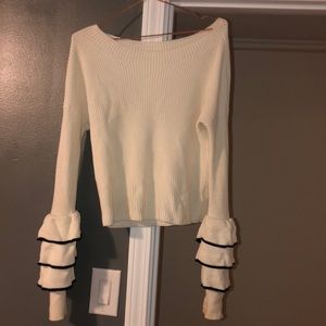 Ruffled sleeve knit blouse